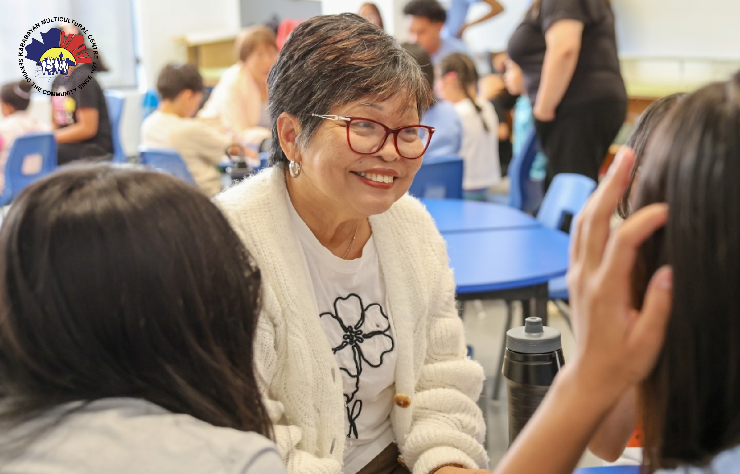 senior volunteering at a youth summer camp