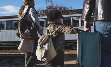 refugee family at the station